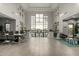 The building lobby offers comfortable seating and stairs to the pool deck at 11664 E Del Timbre Dr, Scottsdale, AZ 85259