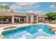 Sparkling pool with spa and desert landscaping, perfect for outdoor enjoyment at 11664 E Del Timbre Dr, Scottsdale, AZ 85259