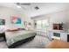 Bright bedroom featuring a makeup vanity, a window seat and plush carpeting at 12462 N 75Th Ln, Peoria, AZ 85381
