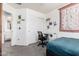 Neutral bedroom offering great natural light, plush carpeting, and easy access to an ensuite bathroom at 12462 N 75Th Ln, Peoria, AZ 85381