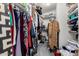 Functional walk-in closet with ample hanging space and shelving for efficient organization at 12462 N 75Th Ln, Peoria, AZ 85381