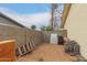 Enclosed backyard with tan stucco walls and a light sand groundcover at 1253 E Avila Ave, Casa Grande, AZ 85122