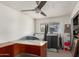 Spacious office area with ceiling fan and natural lighting through window at 1253 E Avila Ave, Casa Grande, AZ 85122
