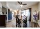 Cozy dining area with hardwood floors and natural light from the sliding glass door at 13605 N Del Webb Blvd, Sun City, AZ 85351