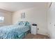Cozy bedroom with a comfortable bed and a neutral color scheme at 13642 N Silverbell Dr, Sun City, AZ 85351