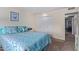 Bedroom featuring a bed, closet, carpet and neutral-painted walls at 13642 N Silverbell Dr, Sun City, AZ 85351