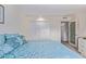 Bright bedroom with a double closet and neutral tones at 13642 N Silverbell Dr, Sun City, AZ 85351