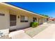 Charming exterior of a single-story home showcasing a neatly landscaped front yard and welcoming entrance at 13642 N Silverbell Dr, Sun City, AZ 85351