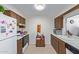 Functional kitchen with classic appliances, ample cabinet space, and a clean, tidy appearance at 13642 N Silverbell Dr, Sun City, AZ 85351