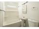 Bright bathroom with a single sink, mirror, and a shower-tub combo at 1432 W 7Th St, Tempe, AZ 85281