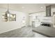 Bright kitchen with white cabinetry, stainless steel appliances, and sleek gray flooring at 1432 W 7Th St, Tempe, AZ 85281