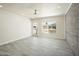 Bright living room features sleek gray flooring and large windows at 1432 W 7Th St, Tempe, AZ 85281