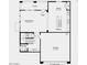 Functional floor plan featuring a spacious great room, dining area, kitchen, and garage at 14630 W Sand Hills Rd, Surprise, AZ 85387
