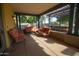 Comfortable outdoor seating on a shaded patio, perfect for relaxing and entertaining guests at 14845 W Georgia Dr, Surprise, AZ 85379
