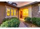 Inviting entrance showcasing stone accents, and well-maintained landscaping at 14845 W Georgia Dr, Surprise, AZ 85379