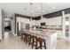 Bright kitchen with granite countertops, stainless steel appliances, and tile flooring at 14845 W Georgia Dr, Surprise, AZ 85379