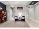 Inviting living room with cozy armchairs, decorative pillows, and tasteful decor accents at 14845 W Georgia Dr, Surprise, AZ 85379