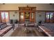 Comfortable covered lounge with wood furnishings and views of the community at 14845 W Georgia Dr, Surprise, AZ 85379