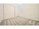 Comfortable carpeted bedroom with a closet and window, a cozy retreat at 15053 W Gray Fox Trl, Surprise, AZ 85387