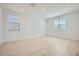 Spacious living room with neutral paint, recessed lighting, and lots of natural light at 15818 W Kendall St, Goodyear, AZ 85338