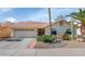 Charming home featuring desert landscaping and a two-car garage at 16224 S 40Th Pl, Phoenix, AZ 85048