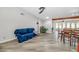 Spacious living area with a comfortable blue couch and modern decor at 16224 S 40Th Pl, Phoenix, AZ 85048