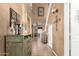 Entryway with tile floors and large decorative chest and multiple architectural embellishments at 16510 W Tether Trl, Surprise, AZ 85387