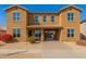 A charming two-story home with a private front entrance and desert landscaping at 16510 W Tether Trl, Surprise, AZ 85387