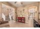 Inviting living space provides views into an office and kitchen, great for entertaining at 16510 W Tether Trl, Surprise, AZ 85387