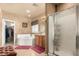Bright main bathroom features a separate tub and shower with tile flooring at 16510 W Tether Trl, Surprise, AZ 85387