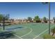 Community basketball court on a sunny day, ready for a pickup game at 17826 W Monte Lindo Ln, Surprise, AZ 85387