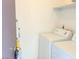 This laundry room features a full size washer and dryer at 2121 W Union Hills Dr # 104, Phoenix, AZ 85027