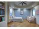 Bedroom features wood floors, recessed lighting, sitting area, and custom ceiling at 22500 N 97Th St, Scottsdale, AZ 85255