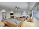 Game room with pool table, comfortable seating, and a ceiling fan at 22500 N 97Th St, Scottsdale, AZ 85255