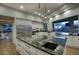 Bright, open kitchen with a large island, stainless appliances, and a seamless flow to the living space at 22500 N 97Th St, Scottsdale, AZ 85255