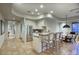 Open kitchen featuring a breakfast bar, stainless steel appliances, and tile flooring at 22500 N 97Th St, Scottsdale, AZ 85255