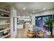 Bright, open kitchen and breakfast nook featuring wood floors and modern lighting at 22500 N 97Th St, Scottsdale, AZ 85255