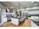 Gourmet kitchen featuring a large island, stainless steel appliances, and custom cabinetry at 22500 N 97Th St, Scottsdale, AZ 85255