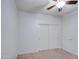 Bedroom with a ceiling fan, carpet, closet, and access to the outside at 23649 W Watkins St, Buckeye, AZ 85326
