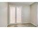 Room with hardwood floors, French doors, and a ceiling fan at 23649 W Watkins St, Buckeye, AZ 85326