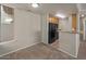 Efficient kitchen layout, equipped with essential appliances and a convenient breakfast bar at 2992 N Miller Rd # 103, Scottsdale, AZ 85251