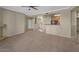 Inviting living room with seamless flow into the kitchen area, perfect for modern living at 2992 N Miller Rd # 103, Scottsdale, AZ 85251