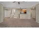 Cozy living room with an adjacent breakfast bar, great for casual dining and entertaining at 2992 N Miller Rd # 103, Scottsdale, AZ 85251
