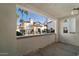 Balcony view overlooking community pool and palm trees at 2992 N Miller Rd # 103, Scottsdale, AZ 85251