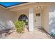 Cozy entrance featuring a decorative window and door plus a stucco column and xeriscaping at 3624 W Whitten St, Chandler, AZ 85226