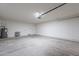 Bright two-car garage with concrete flooring and modern lighting, perfect for vehicles at 3624 W Whitten St, Chandler, AZ 85226