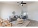 Spacious living area filled with natural light, wood flooring, and comfortable seating at 3624 W Whitten St, Chandler, AZ 85226