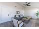 Inviting living room featuring modern furniture, neutral colors, and ample natural light at 3624 W Whitten St, Chandler, AZ 85226