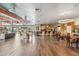 Spacious clubhouse boasts a full kitchen, dining tables, and comfortable seating area at 3713 E Cat Balue Dr, Phoenix, AZ 85050