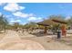 Community park featuring a covered picnic area with tables, benches, and barbecue grill at 3713 E Cat Balue Dr, Phoenix, AZ 85050